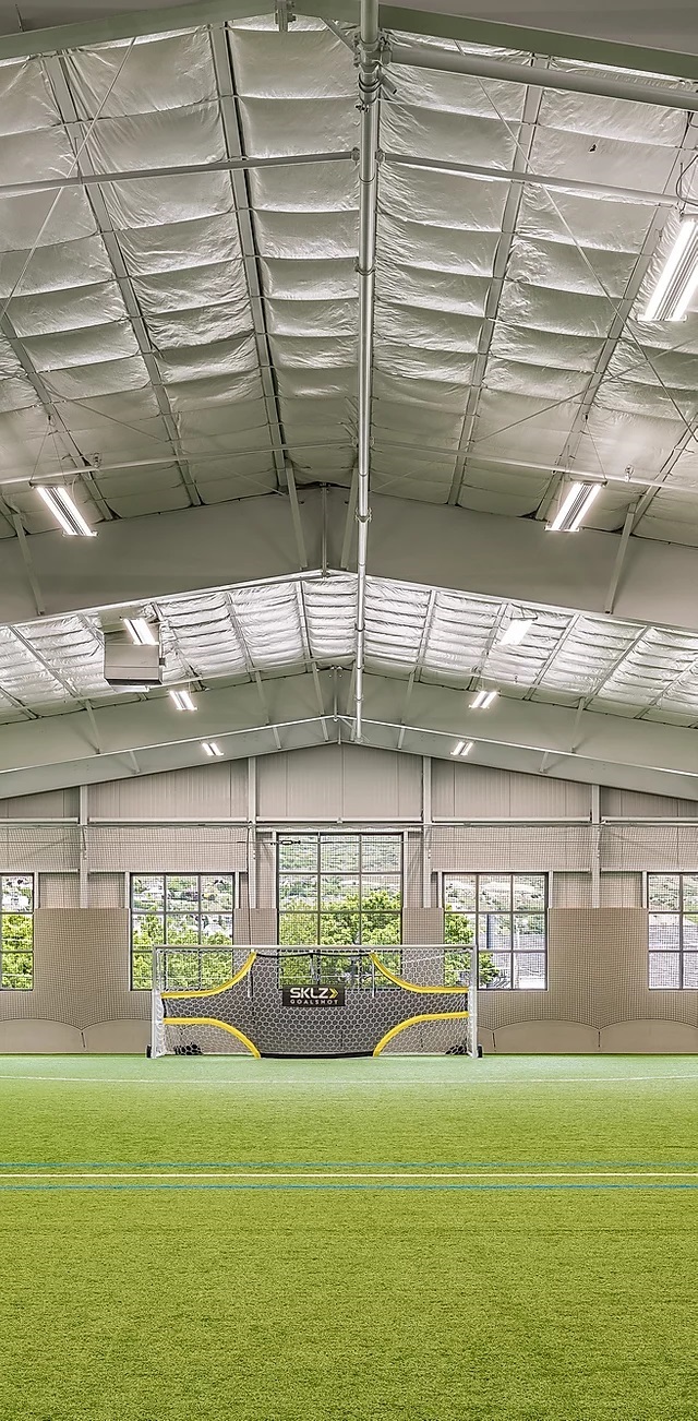 Indoor sports field inside a steel recreational building