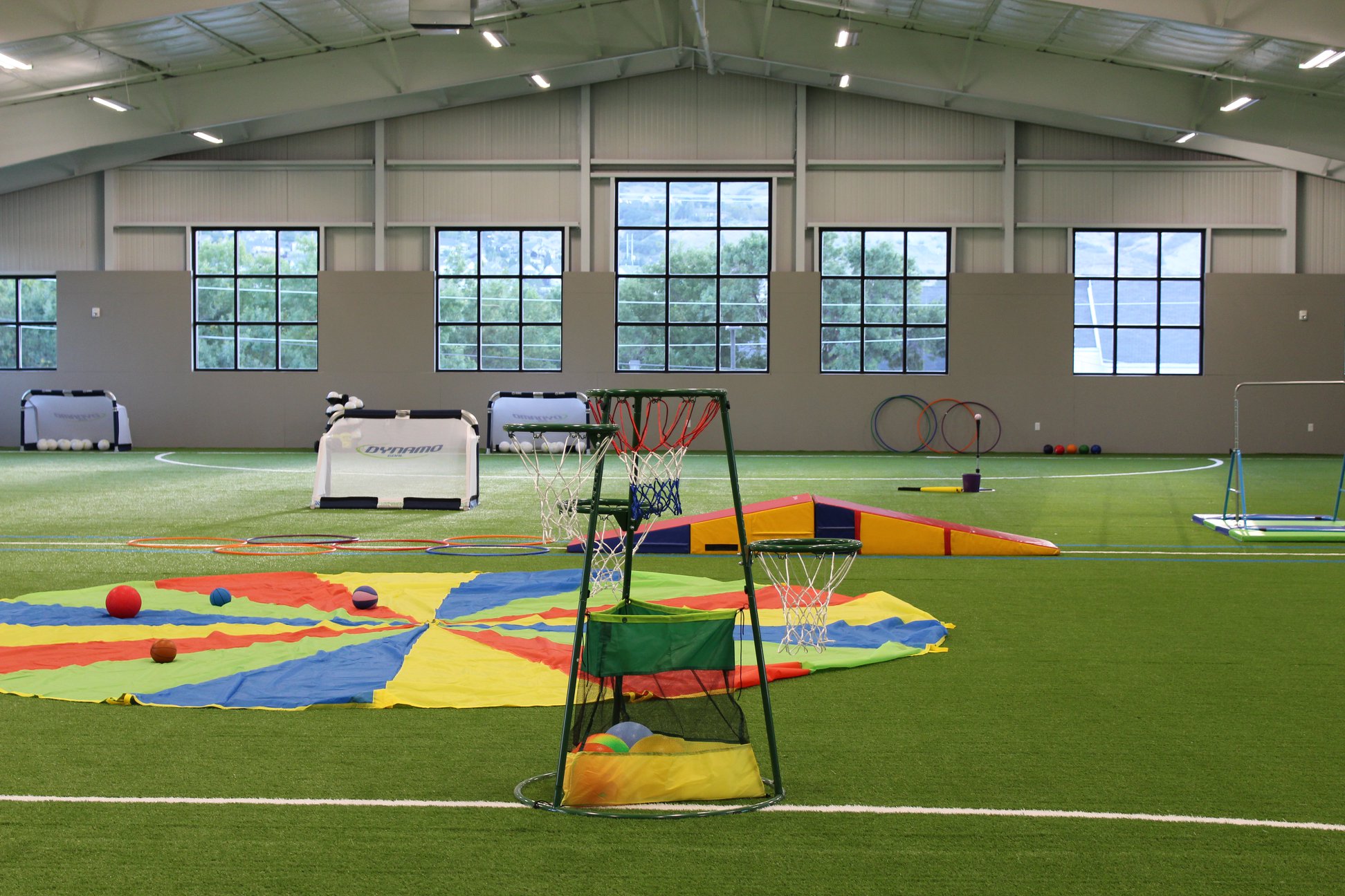 Indoor gymnasium inside a steel recreational building